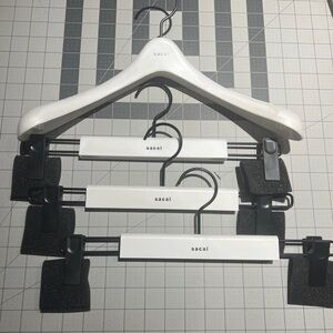 Sacai White and Black Hangers Set